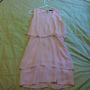 Baby pink zip-up dress with back showing