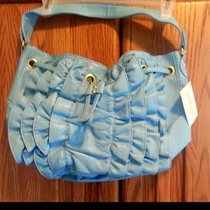 Joan rivers classic ruffled purse.