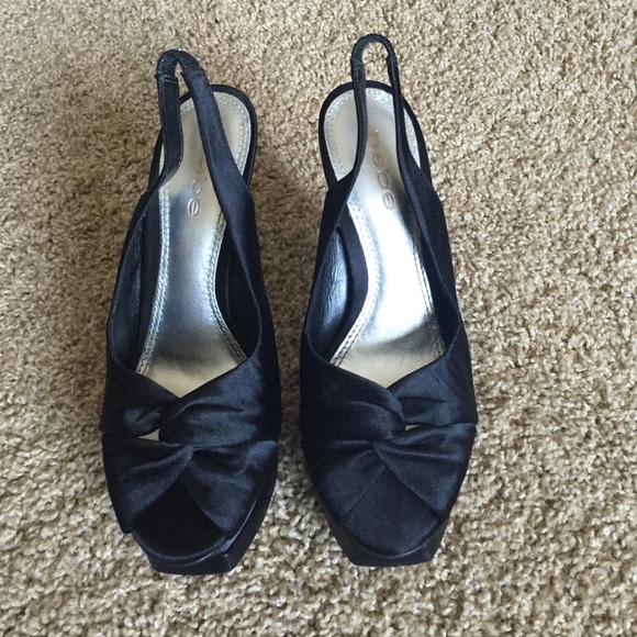 Bebe black satin flatform dress shoes.