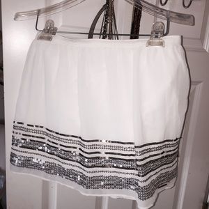 White with silver sequence skirt
