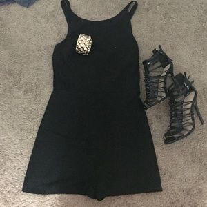Black romper with side lace detail