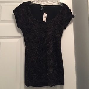 Black shirt with gold swirls