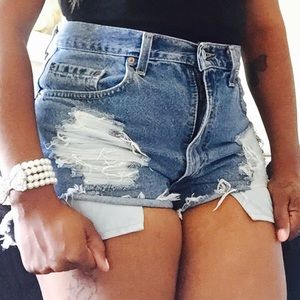 high waisted jean shorts .