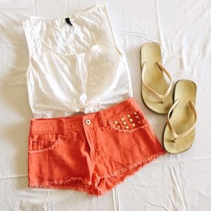 Coral studded shorts.