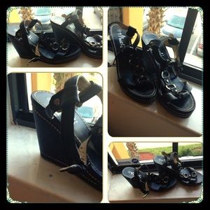 Black "buckle design" wedges