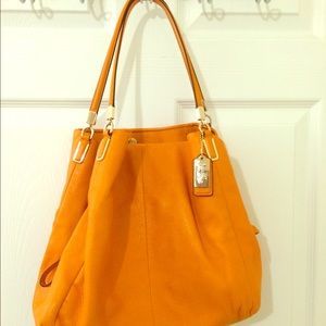 Gorgeous Coach orange shoulder bag