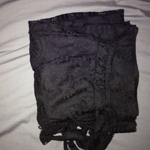 Black lace palazzo pants.