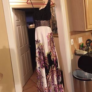 Gorgeous prom dress with open back and a train