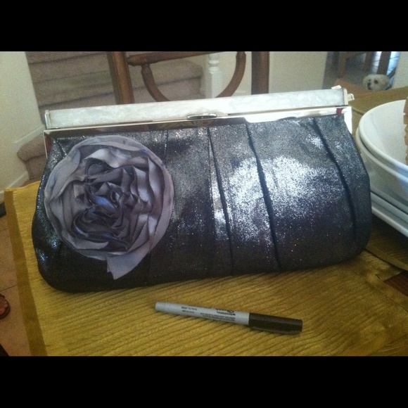 Purple clutch purse with flower