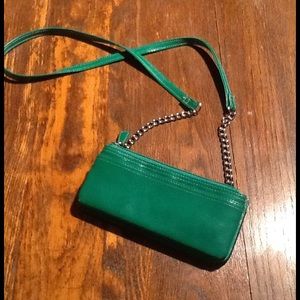 Bright green wallet style cross-body bag