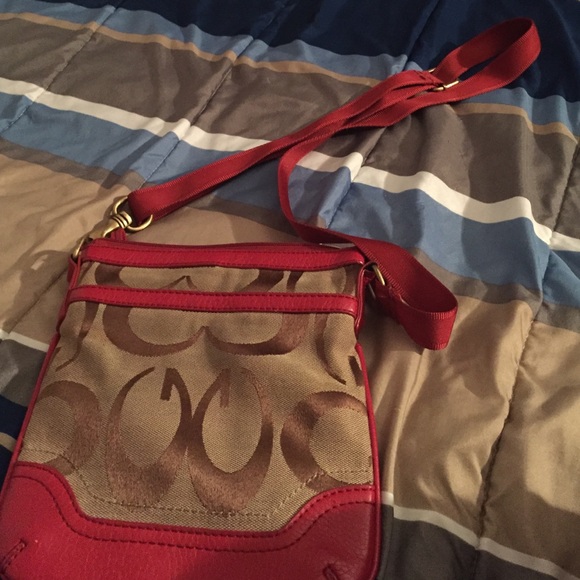 A none name brand red and brown purse