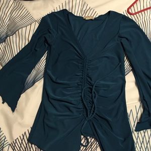 Tie front teal shirt.