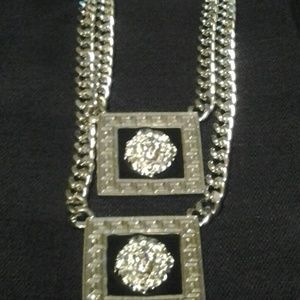 Silver lion head necklace