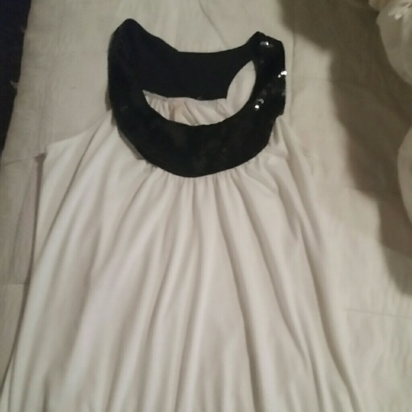 Flowy white shirt with black sequin detail
