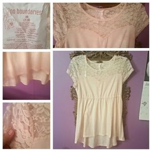 A lace high low shirt, don't need it
