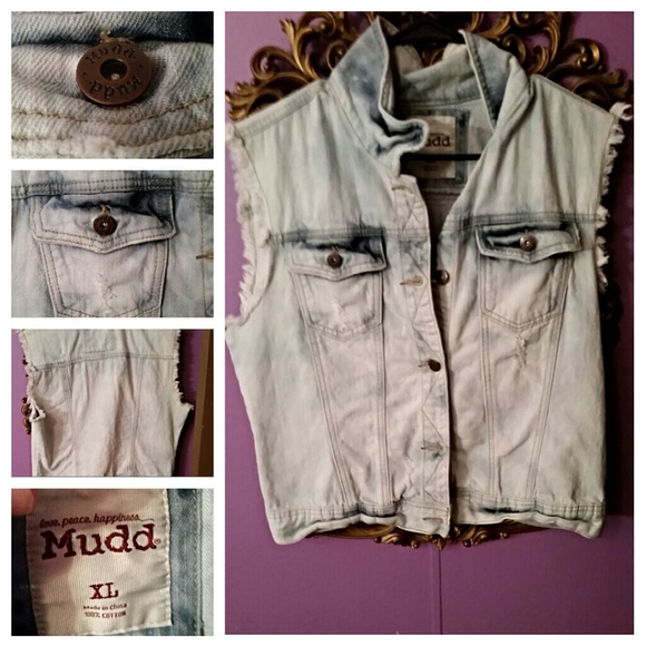A bleached distressed denim vest from mudd