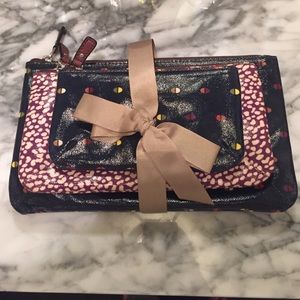 Fossil Clutch or coin purse, set of three