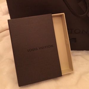 Small Louis Vuitton box usually holds coin purse
