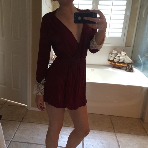 maroon dress, with white lace sleeves