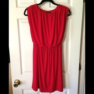 Red cinched flouncy dress