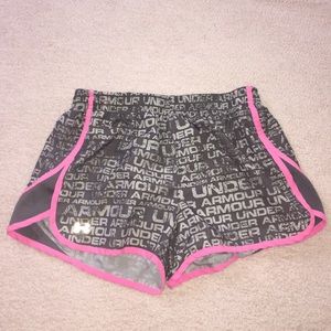 Under armour pink and grey running shorts