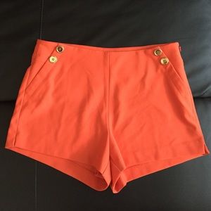 Orange high waisted shorts