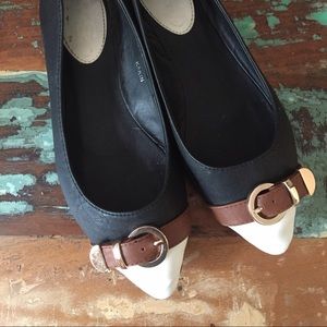 Black white and brown pointed toe flats