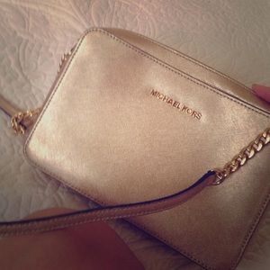 Gold Michael Kors crossbody purse