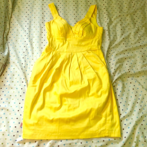 Bright yellow fitted sleeveless dress