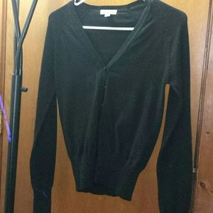 Long black sleeve sweater.
