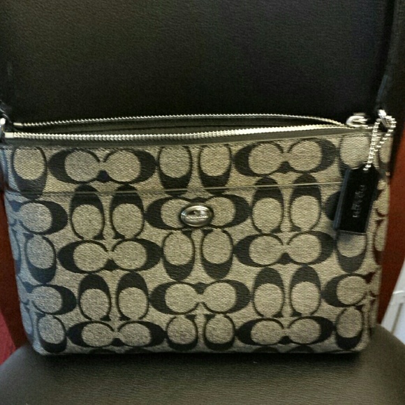 Coach New York Purse with small carrying case.