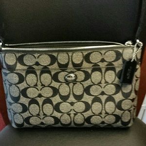Coach New York Purse with small carrying case.