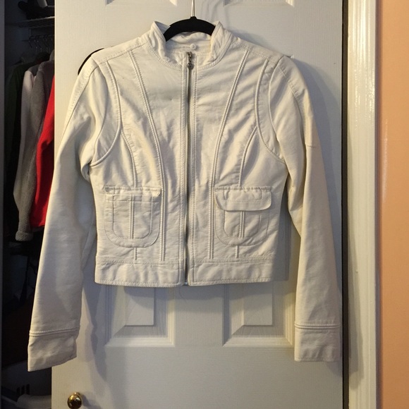 Cream faux leather jacket.