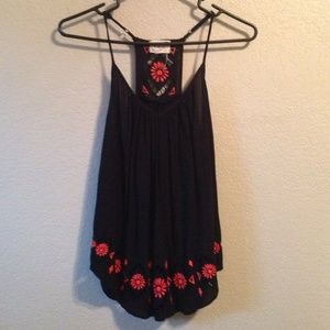 Black tank with orange and cutout details