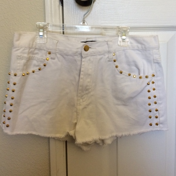 White shorts with gold studs