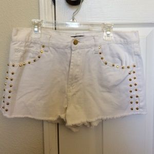 White shorts with gold studs