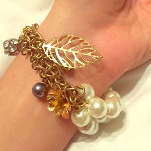 Pearl bracelet with chain and charms