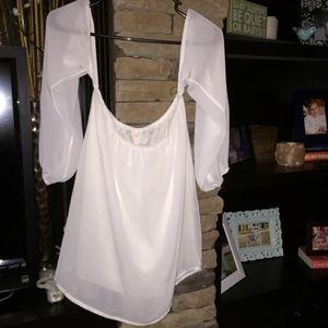 Chiffon flowy top! It shows your shoulders .