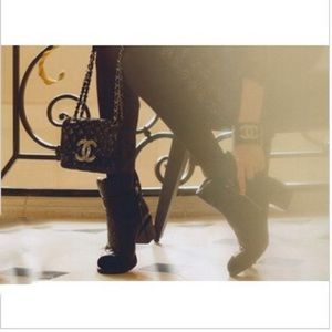 Black quilted zip boots