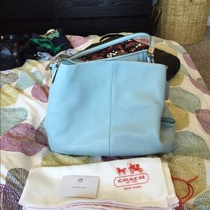 Beautiful blue coach bag.