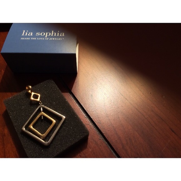 Gold and silver colored Lia Sophia Pendent