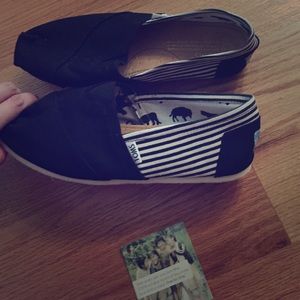 Toms black and white shoes