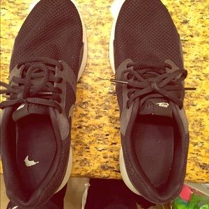 Black and white Nike running shoes