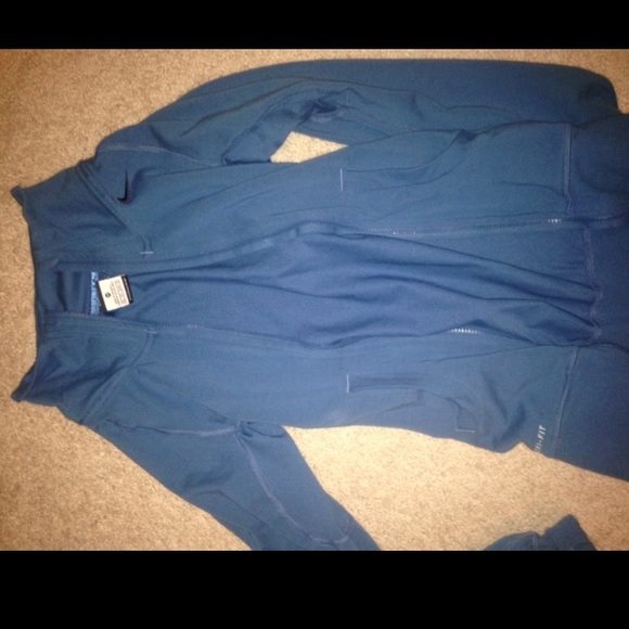 Nike zip up hoodie. The color is teal.