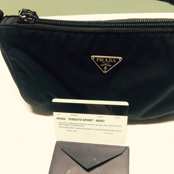 Prada Clutches & Wallets - Authentic Prada wristlet black bag