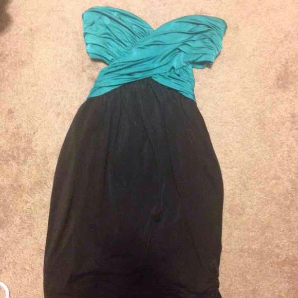 Teal & black sleeveless & open back dress.