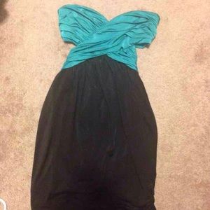 Teal & black sleeveless & open back dress.