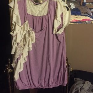 Purple top with ruffles and lace details