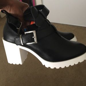 Black & white open ankles boot-like heels
