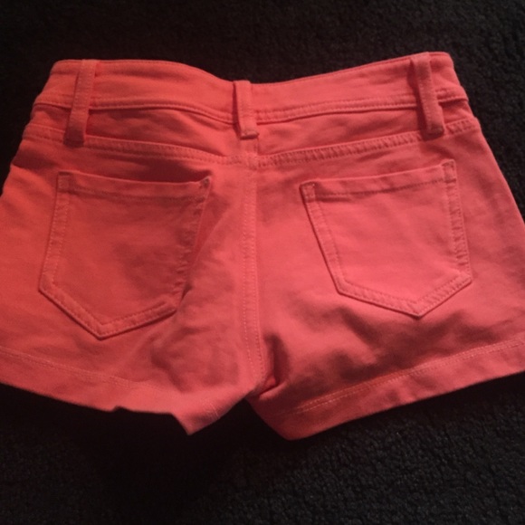 Mango colored shorts